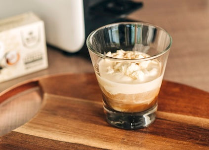 Bebida Dulce Espresso preparada con café espresso y espuma cremosa.